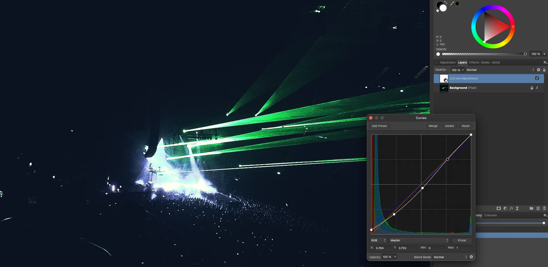 Image editing tools displayed on top of a concert photograph depicting lights and lasers